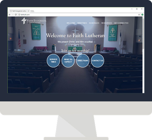 A desktop monitor showing the Faith Lutheran website
