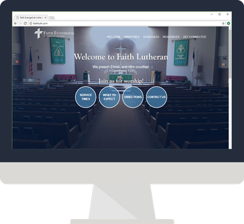 A desktop monitor showing the Faith Lutheran website